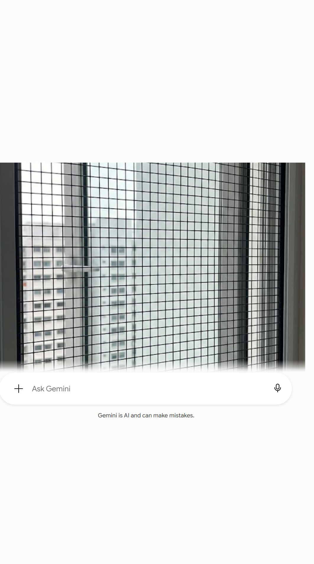Close-up of PVC-coated cat safety mesh stretched taut on an HDB window frame, showing the grid pattern and neat edges